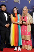 Charger l'image dans la galerie, P&G wins an Emmy for its anti-racism commercial ‘The Talk’. Award winner wears a full Chroma skirt and top look while holding the Emmy award with fellow winner.