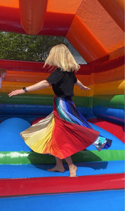 @alexas_lens having the best time on a bouncy castle while wearing the Chroma skirt