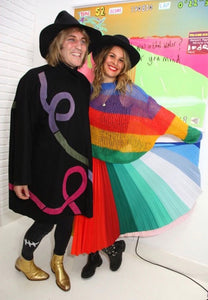 Lliana Bird wearing her Chroma skirt with a stunning loose knit, with Noel Fielding 
